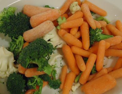 A platter of carrots, broccoli and cauliflower.